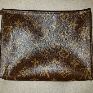 Pre-Owned Luxury Handbags Louis Vuitton Makeup Pouch – Spicer Greene  Jewelers